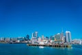 AUCKLAND, NEW ZEALAND- MAY 12, 2017: Beautiful view of the largest and most populous urban area in Auckland with a wharf Royalty Free Stock Photo