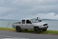 AUCKLAND, NEW ZEALAND - Nov 08, 2020: silver Mazda Bounty Turbo pickup truck parked at Eastern Beach