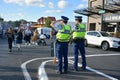 AUCKLAND, NEW ZEALAND - Nov 20, 2020: two policemen observing crowd filling in Picton Street during Christmas community market