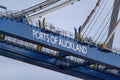 Ports of Auckland sign on container crane