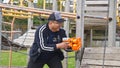 Auckland, New Zealand, 10th of Nov 2019, adults and kids playing nerf gun together at an outdoor children playground