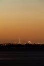 Auckland NZ distant citylight skyline after sunset Royalty Free Stock Photo