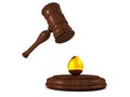 Auction gavel hammer with golden egg Royalty Free Stock Photo