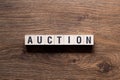 Auction - word concept on building blocks, text Royalty Free Stock Photo