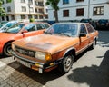 Audi 100 executive vintage car parking on street