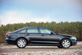 Audi A6 4G, C7 2.0 TDI 190 Hp 2016 facelift front view outdoors on winter road with forest on background