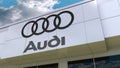 Audi logo on the modern building facade. Editorial 3D rendering