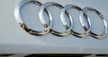 Audi logo on white car diesel emissions scandal media