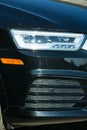 AUDI Q3 in black. Subcompact luxury crossover Audi Q3. Detailing. Headlight type Royalty Free Stock Photo
