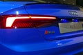 WOLFSBURG, GERMANY - March 22, 2019: Audi RS5 closeup backside with lights and logo in showroom `Autostadt Wolfsburg`