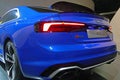 WOLFSBURG, GERMANY - March 22, 2019: Audi RS5 closeup backside with lights and logo in showroom `Autostadt Wolfsburg`