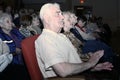 The audience and the audience are retired, elderly world war II veterans and their relatives. Royalty Free Stock Photo