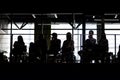 Audience on balcony at a business conference. Silhouette photo.