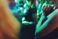 Audience with hands in the air at a music festival. Royalty Free Stock Photo