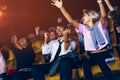 Audience is happy and exciting in movie theater