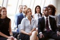 Audience Listening To Speaker At Business Conference