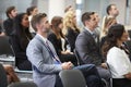 Audience Listening To Speaker At Conference Presentation Royalty Free Stock Photo