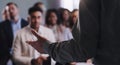 Audience, presentation and business people with hand of a speaker at a seminar, workshop or training. Diversity men and Royalty Free Stock Photo