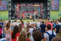 Couple is watching concert at open air music festival