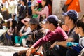 Audience watching debating Tibetan Buddhist monks at Sera Monastery