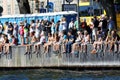 Audience watching from the quay