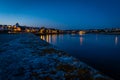 Audiernes town and harbour at night with lights on in Bretagne