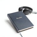 Audio book education on white background Royalty Free Stock Photo