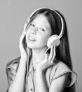 Audio book. Educative content. Study english language with audio lessons. Girl listen music modern headphones gadget