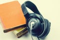 Audio books concept with old books Royalty Free Stock Photo