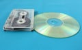 Audio cassette and compact disk.connection times Royalty Free Stock Photo