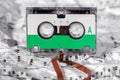 Audio cassette on the music sheet Royalty Free Stock Photo