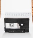 Audio cassette. Retro music medium, compact cassette tape recorder. Royalty Free Stock Photo