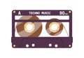 Audio cassette from 90s. Retro magnetic tape record of techno music. Old analogue transparent casette. Obsolete Royalty Free Stock Photo