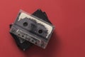 Audio cassette tape on red backgound Royalty Free Stock Photo