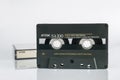 Audio cassette TDK SA100 Super Avilyn 100 minutes on a white background with reflection