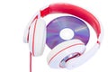 Audio compact disc and red white headphones Royalty Free Stock Photo