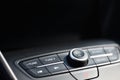 Audio control in a car with a black background for copy space Royalty Free Stock Photo