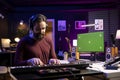 Audio engineer playing piano electronic keyboard notes in home studio