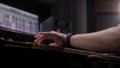 Audio engineer uses digital electric piano for creating music
