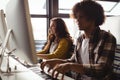 Audio engineers playing electric keyboard