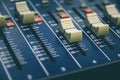 Audio mixer console and professional sound mixing with buttons and sliders Royalty Free Stock Photo