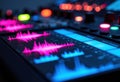 Digital DJ controller with colorful illuminated waveforms and controls for music mixing Royalty Free Stock Photo