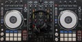 Audio mixing controller with professional headphones. DJ tools