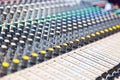 Audio sound mixer console with buttons and sliders. Selective focus Royalty Free Stock Photo