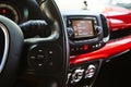 Audio system and Voice dialing control buttons on steering wheel. Car interior. Shallow dof Royalty Free Stock Photo