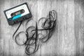 audio tape rolled out background wood vintage unroll compact cassette playlist musicassette Royalty Free Stock Photo