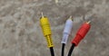 Audio video cable RCA to 3.5mm jack. RCA cable connector, RCA connector on floor Background, Red white Yellow connector Jack, Royalty Free Stock Photo