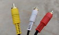 Audio video cable RCA to 3.5mm jack. RCA cable connector, RCA connector on floor Background, Red white Yellow connector Jack, Royalty Free Stock Photo