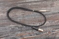 audio xlr trs cable on wood Royalty Free Stock Photo