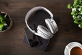 Audiobook concept modern wireless headphones smartphone book